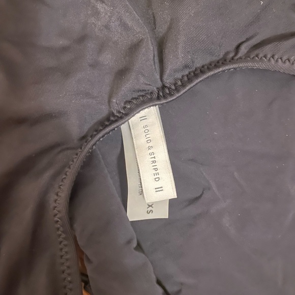 Solid and striped one piece🖤 - Picture 2 of 4